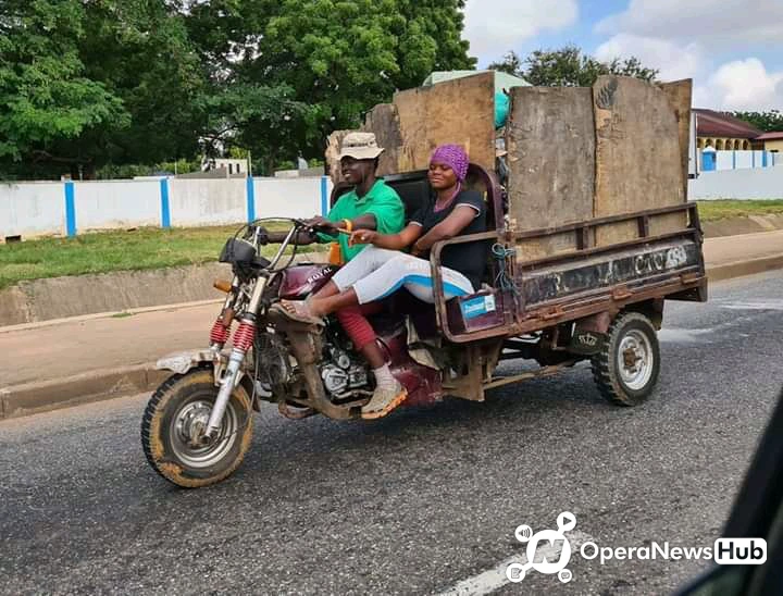 Social Media Users Reacts As A Beautiful Lady Spotted Helping Her Boyfriend Who Carries Rubish For A Living