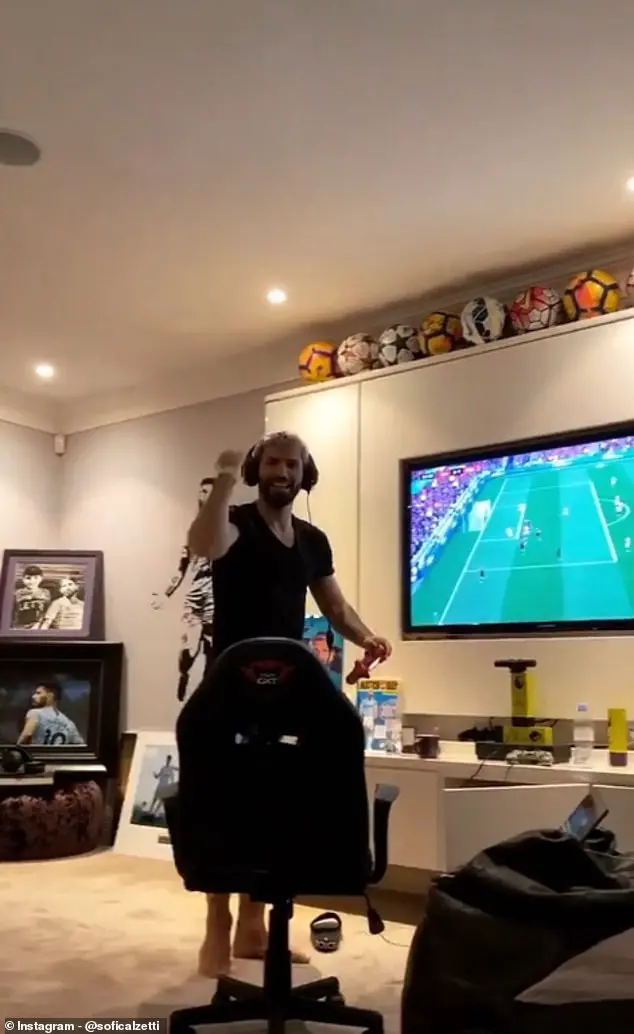 Aguero pumps his fist in celebration as he wins his third game of FIFA 20 in a row