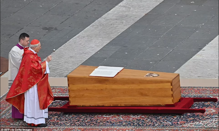 Pope Francis presides as Pope Benedict XVI is laid to rest (photos)