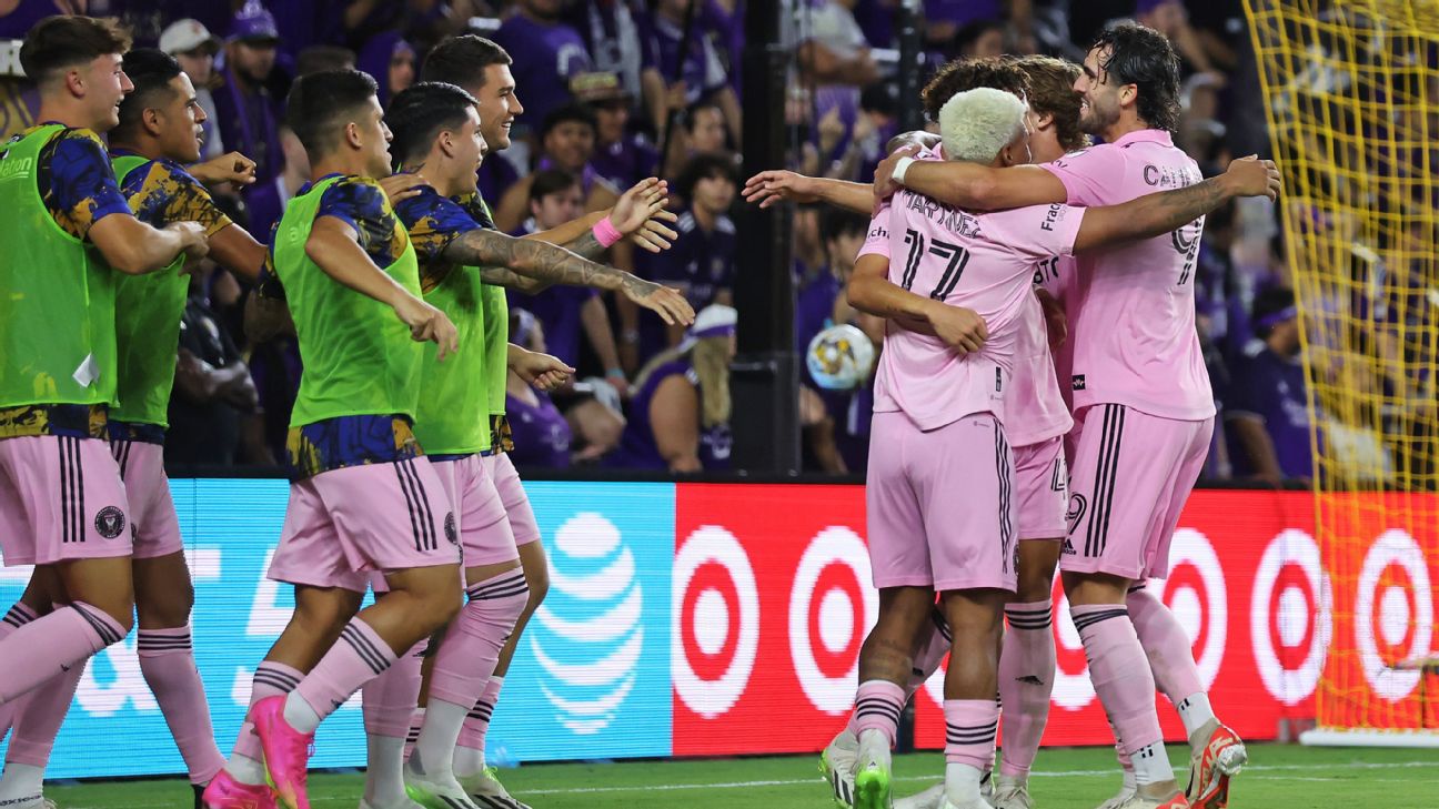 Miami players celebrate after scoring a goal against Orlando City.
