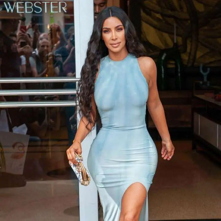 Kim Kardashian posing for a picture: Kim Kardashian West