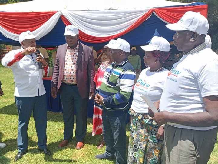 The New Democrats party leader Thuo Mathenge (in white shirtv) during meeting with party leaders from Mount Kenya region .The event was held at Bantu Africa