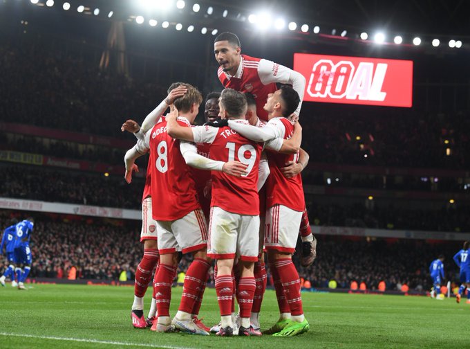 The Arsenal players celebrate after Martin Odegaard sweeps in our third goal