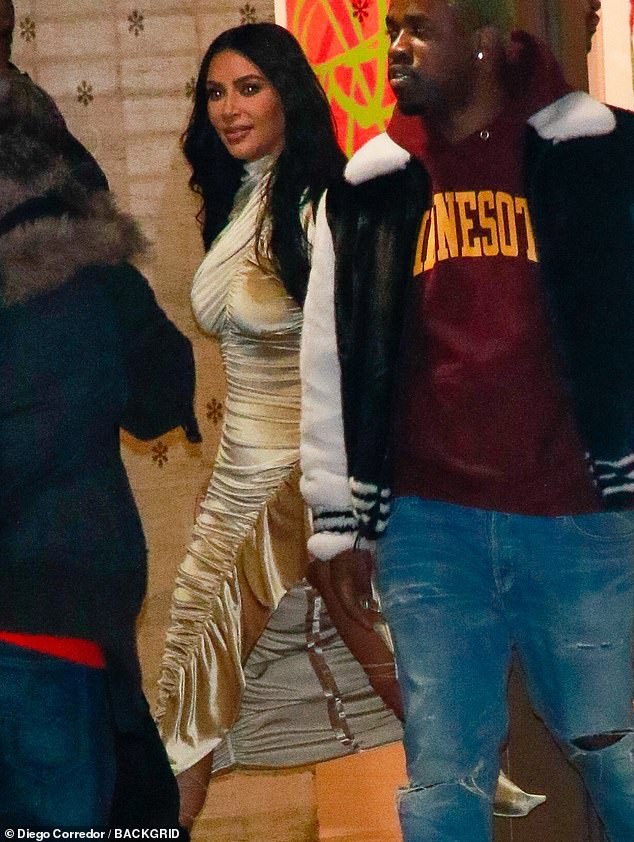 Chic in white: The kids matched in all-white looks as they were spotted exiting the theater with their parents