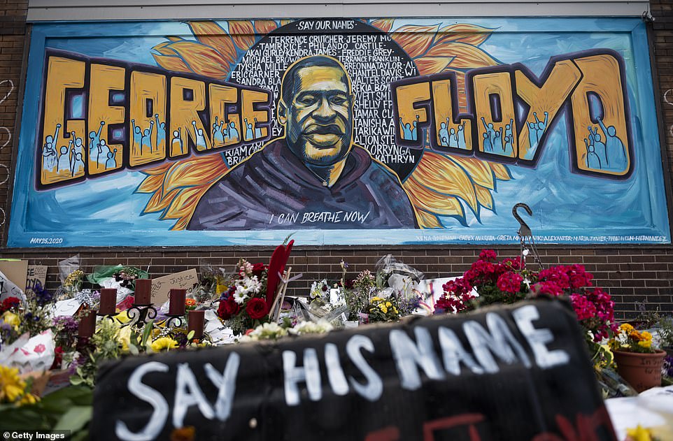 A memorial site where George Floyd died May 25 while in police custody has been created with hundreds of floral tributes