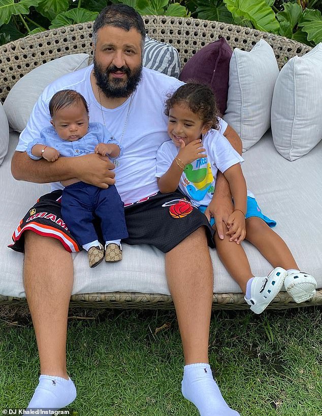 Dash of grey: The 44-year-old sported a messy, overgrown head of hair and beard, featuring some grey around the sides