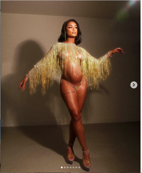 Pregnant Dani Leigh strips down completely to show off her baby bump?(Photos)