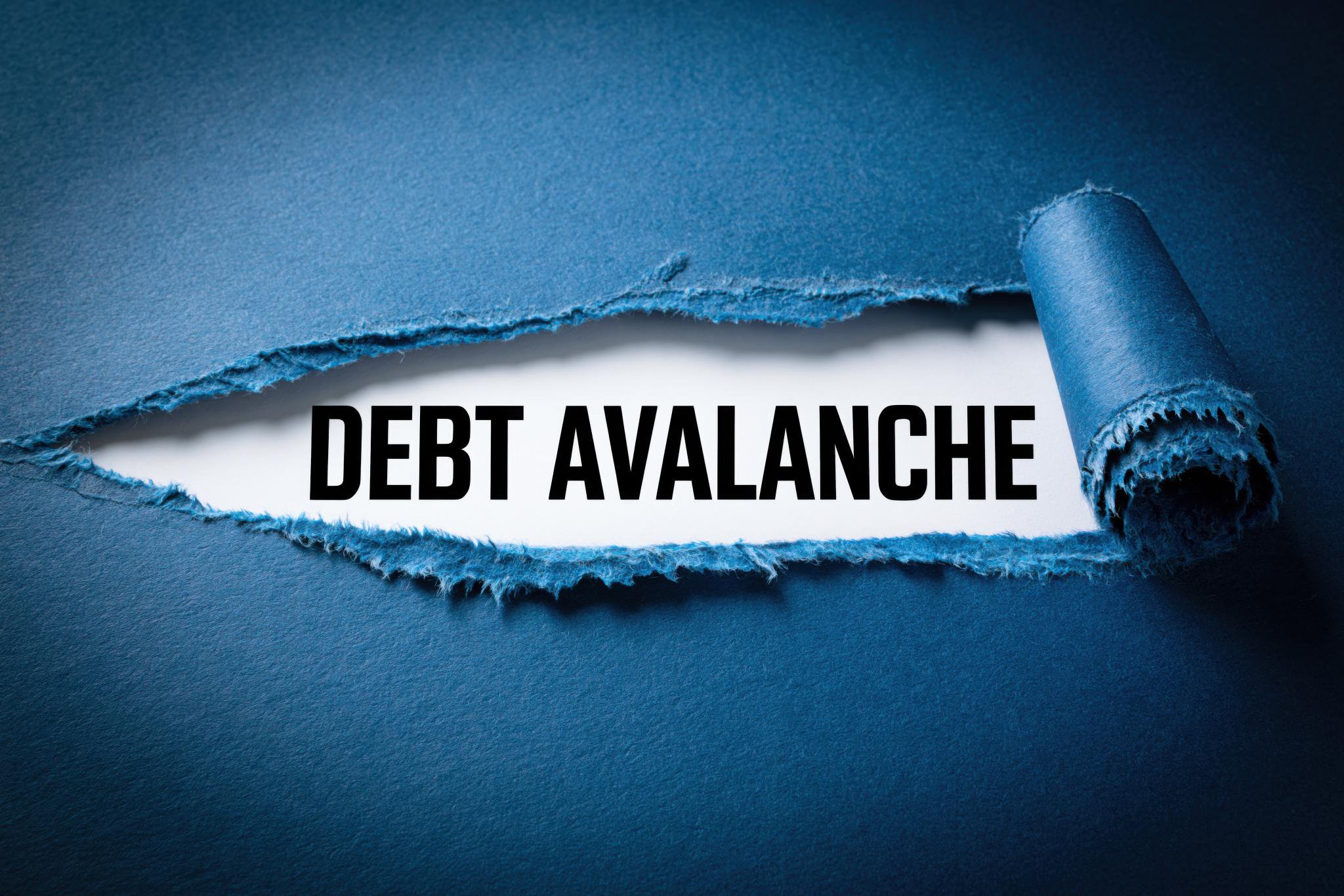 The words "DEBT AVALANCHE" appearing through a tear in blue paper.