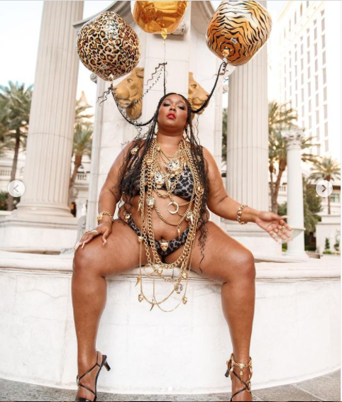 Lizzo showcases her famous curves in a tiger-print bikini to celebrate her 33rd birthday (photos)