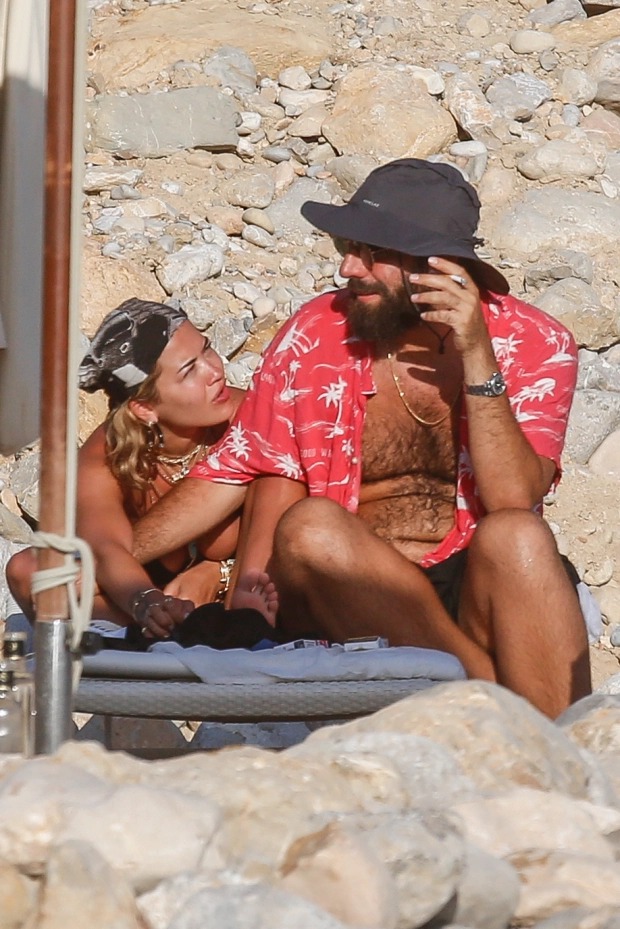 Rita Ora goes topless as she sunbathes with her boyfriend Romain Gavras and friends in Ibiza (Photos)