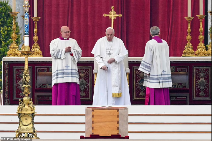 Pope Francis presides as Pope Benedict XVI is laid to rest (photos)