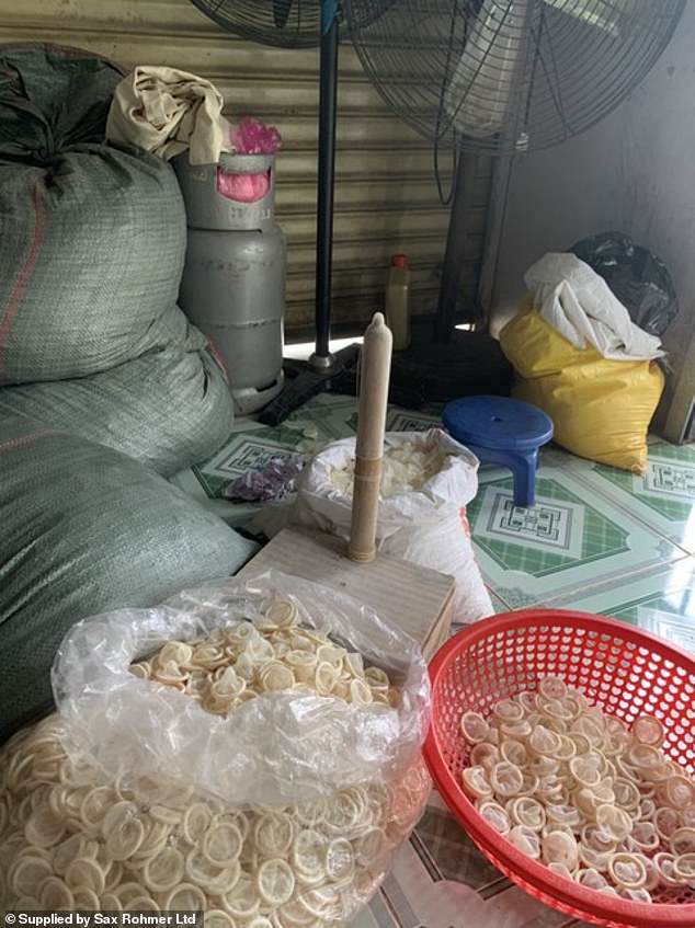 Police seize 324,000 used condoms as they bust factory repackaging them and selling back to the public (photos)