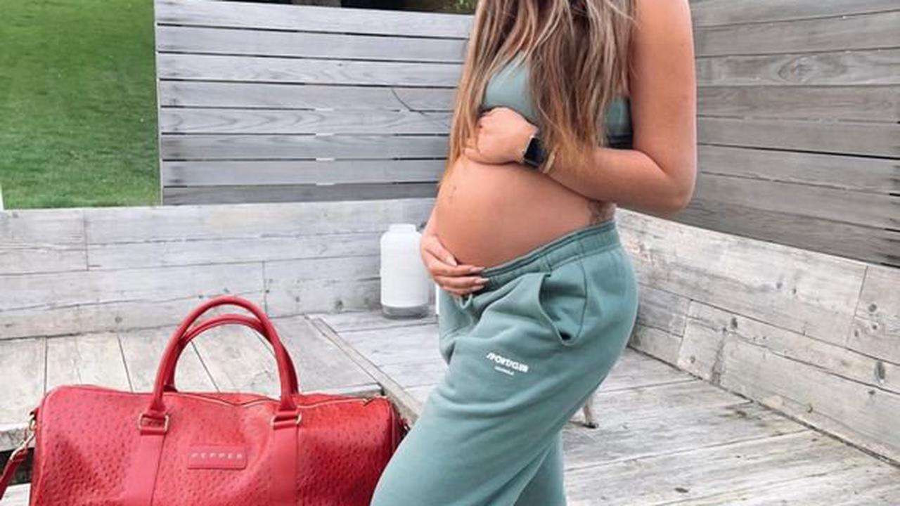 Charlotte Crosby cradles her bump and shares gender reveal party plans